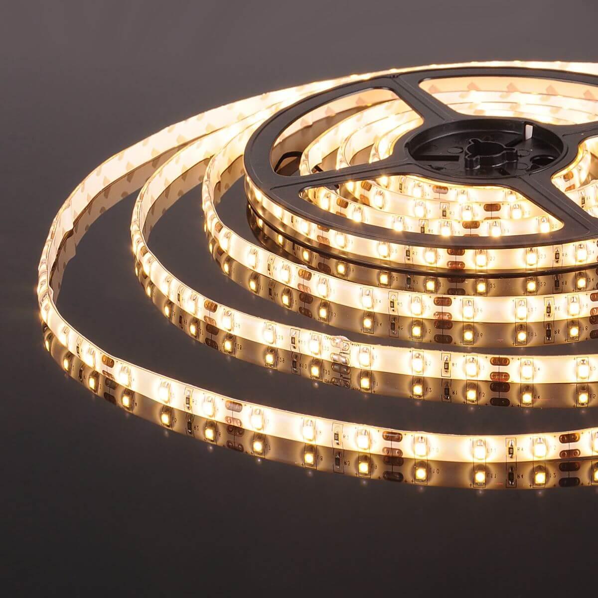 фото светодиодная влагозащищенная лента elektrostandard 4,8w/m 60led/m 2835smd теплый белый 5m a052956 | 220svet.ru