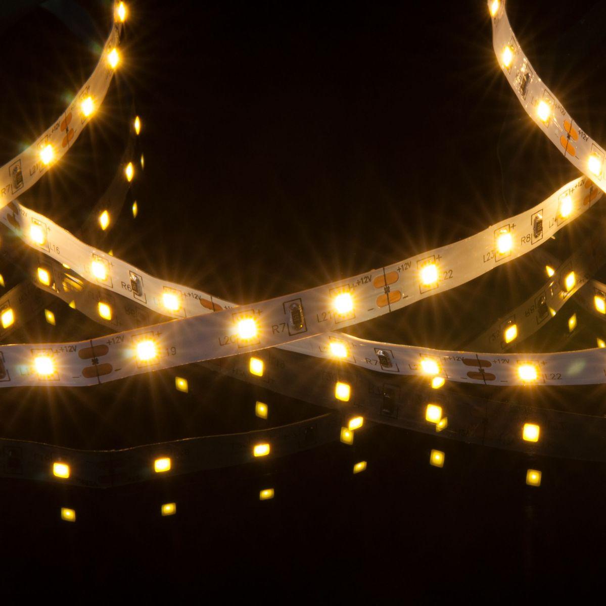 фото светодиодная лента elektrostandard 4,8w/m 60led/m 2835smd теплый белый 5m a049836 | 220svet.ru